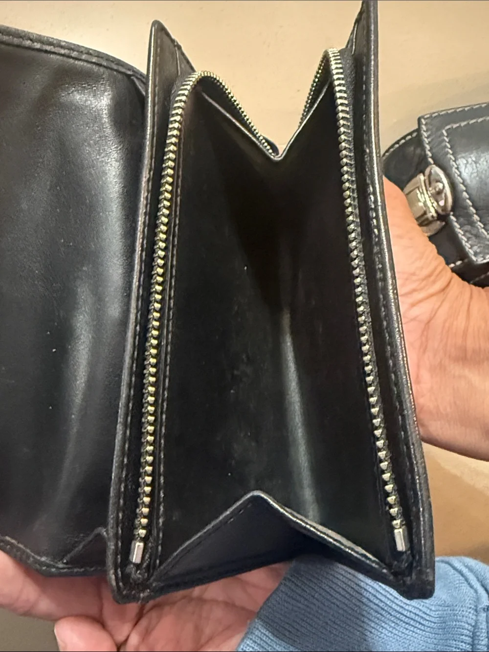 Coach Black Leather Wallet with White Stitching and Buckle